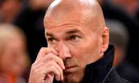 Real Madrid's French coach Zinedine Zidane looks on before the Spanish league football match between Valencia CF and Real Madrid CF at the Mestalla stadium in Valencia on April 3, 2019. (Photo by JOSE JORDAN / AFP)
