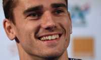 (FILES) In this file photo taken on July 13, 2018 France's forward Antoine Griezmann holds a press conference in Istra, two days before the Russia 2018 World Cup final football match between France and Croatia. - French striker Antoine Griezmann has told Atletico Madrid he will leave them in the close season, the Spanish club said on Twitter on May 14, 2019. The 28-year-old Griezmann has a contract until 2023 with Atletico, but has a buy out clause of 120million euros ($134million) and has been the target of several approaches from La Liga rivals Barcelona. (Photo by FRANCK FIFE / AFP)