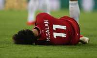 FMA0001. Newcastle (United Kingdom), 04/05/2019.- Liverpool's Mo Salah lies on the pitch after colliding with Newcastle United goalkeeper Martin Dubravka (not seen) during the English Premier League soccer match between Newcastle United and Liverpool FC at St James' Park in Newcastle, Britain, 04 May 2019. (Reino Unido) EFE/EPA/NIGEL RODDIS EDITORIAL USE ONLY. No use with unauthorized audio, video, data, fixture lists, club/league logos or 'live' services. Online in-match use limited to 120 images, no video emulation. No use in betting, games or single club/league/player publications