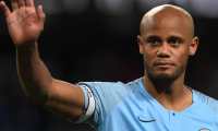 (FILES) In this file photo taken on May 6, 2019 Manchester City's Belgian defender Vincent Kompany takes part in a lap of appreciation after the final whistle of the English Premier League football match between Manchester City and Leicester City at the Etihad Stadium in Manchester, north west England. - Club captain Vincent Kompany announced Sunday, May 19 that he is to leave Manchester City after 11 trophy-laden years. (Photo by Paul ELLIS / AFP) / RESTRICTED TO EDITORIAL USE. No use with unauthorized audio, video, data, fixture lists, club/league logos or 'live' services. Online in-match use limited to 120 images. An additional 40 images may be used in extra time. No video emulation. Social media in-match use limited to 120 images. An additional 40 images may be used in extra time. No use in betting publications, games or single club/league/player publications. /