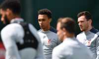 Liverpool's English defender Trent Alexander-Arnold (L) and Liverpool's Scottish defender Andrew Robertson take part in a training session at the Melwood Training ground in Liverpool, northwest England on May 28, 2019. (Photo by Anthony Devlin / AFP)