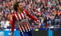 (FILES) In this file photo taken on February 9, 2019 Atletico Madrid's French forward Antoine Griezmann celebrates after scoring during the Spanish league football match Club Atletico de Madrid against Real Madrid CF at the Wanda Metropolitano stadium in Madrid. - French striker Antoine Griezmann has told Atletico Madrid he will leave them in the close season, the Spanish club said on Twitter on May 14, 2019. The 28-year-old Griezmann has a contract until 2023 with Atletico, but has a buy out clause of 120million euros ($134million) and has been the target of several approaches from La Liga rivals Barcelona. (Photo by PIERRE-PHILIPPE MARCOU / AFP)