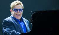 Elton John performs on stage at Staples Center on Saturday, October 4, 2014, in Los Angeles. (Photo by Paul A. Hebert/Invision/AP)