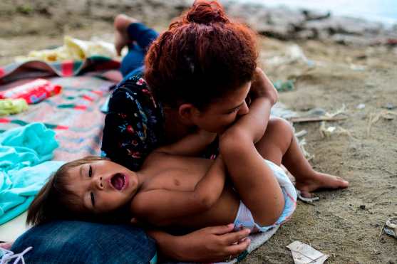 El presidente de Estados Unidos, Donald Trump, ha indicado que penalizará a México con tasas impositivas si no se frena la migración a ese país. Foto Prensa Libre: AFP