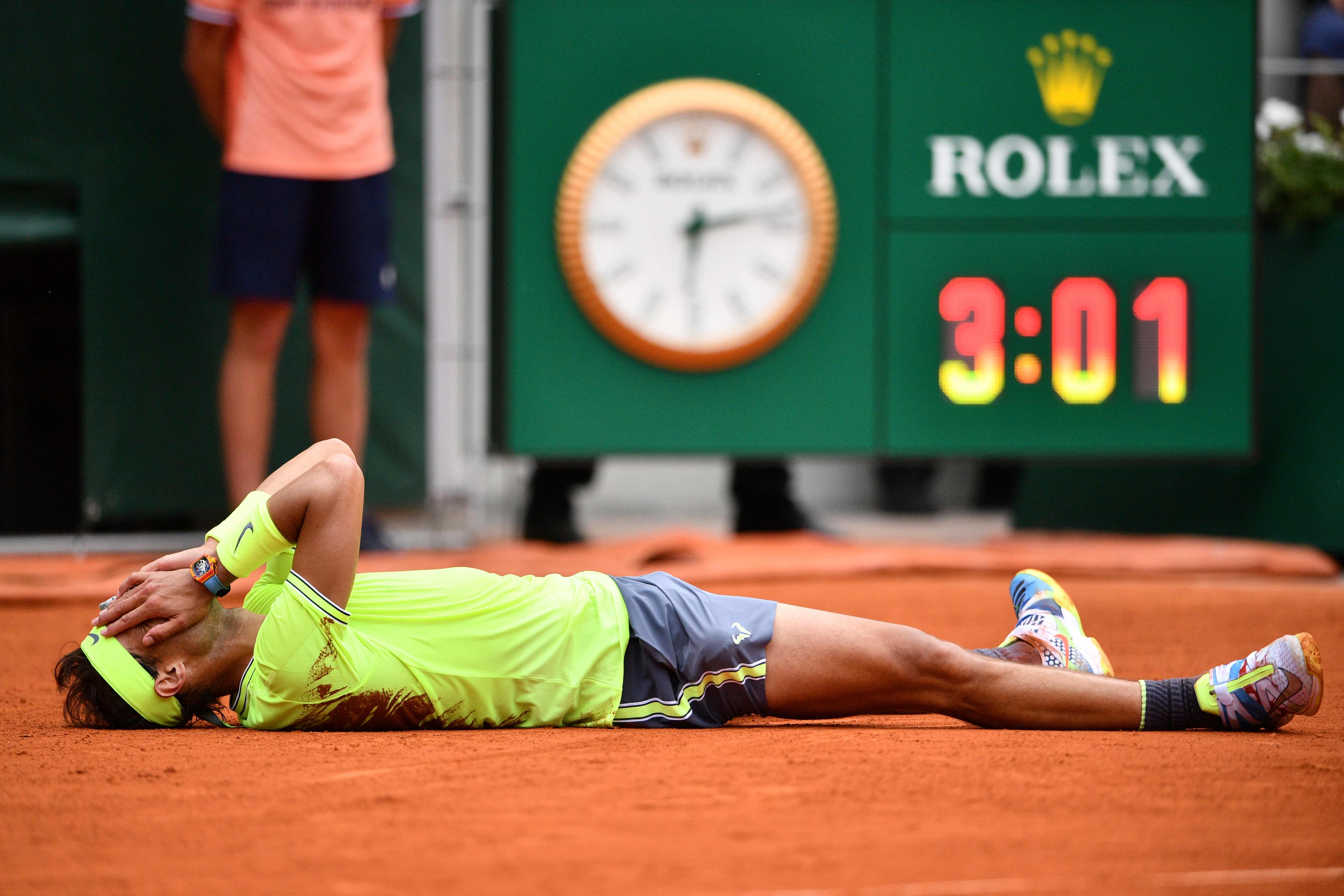 Rafael Nadal hace historia al ganar su triunfo numero 12 de Roland Garros. (Foto Prensa Libre: EFE)