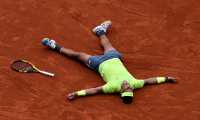 Rafael Nadal hace historia al ganar su triunfo numero 12 de Roland Garros. (Foto Prensa Libre: EFE)