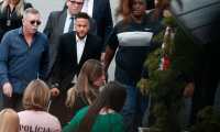 Brazilian football player Neymar (C) arrives on crutches at the Women's Defence Precinct in Sao Paulo, Brazil on June 13, 2019 to testify after Brazilian Najila Trindade filed a complaint against him on May 31, saying he assaulted her after inviting her to visit him in Paris. - Brazilian police said on Thursday they had filed a defamation suit against the woman who has accused football star Neymar of rape, after she insinuated the force was corrupt. (Photo by Ari FERREIRA / AFP)