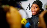 South African Caster Semenya speaks with journalists after the women's 20000m race during the France's LNA (athletics national association) Pro Athle Tour meeting on June 11, 2019 at the Jean-Delbert stadium in Montreuil, a Paris neighbouring suburb. - The double 800m Olympic champion, who was racing for the first time since a controversial new gender ruling came into effect, finished in 5min 38.19sec ahead of Ethiopian pair Hawi Feysa and Adanech Anbesa. (Photo by GEOFFROY VAN DER HASSELT / AFP)