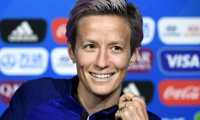 United States' captain Megan Rapinoe smiles during a press conference at the Groupama stadium in Decines-Charpieu on July 6, 2019, during the France 2019 football Women's World Cup. - USA will face The Netherlands for the final of the France 2019 Women's World Cup on July 7, 2019. (Photo by FRANCK FIFE / AFP)