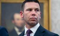 Washington (United States), 26/07/2019.- Acting Homeland Security Secretary Kevin McAleenan watches President Trump speak to the press after he signed a deal to limit asylum claims from Guatemala in the Oval Office of the White House in Washington, DC, USA, 26 July 2019. After the signing, the president spoke about Mueller's testimony before Congress, taxing French wine, and the North Korean missile launch, among other issues. (Estados Unidos) EFE/EPA/JIM LO SCALZO