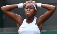 US player Cori Gauff celebrates after beating US player Venus Williams during their women's singles first round match on the first day of the 2019 Wimbledon Championships at The All England Lawn Tennis Club in Wimbledon, southwest London, on July 1, 2019. (Photo by Ben STANSALL / AFP) / RESTRICTED TO EDITORIAL USE