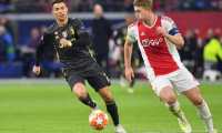 (FILES) In this file photo taken on April 10, 2019 Juventus' Portuguese forward Cristiano Ronaldo (L) and Ajax's Dutch defender Matthijs de Ligt run with the ball during the UEFA Champions League first leg quarter-final football match between Ajax Amsterdam and Juventus FC at the Johan Cruijff Arena in Amsterdam. - Matthijs de Ligt is closing in on a move to Juventus after Ajax announced on July 13, 2019 that the rising star will skip the Dutch champions pre-season training camp due to his expected departure. (Photo by EMMANUEL DUNAND / AFP)