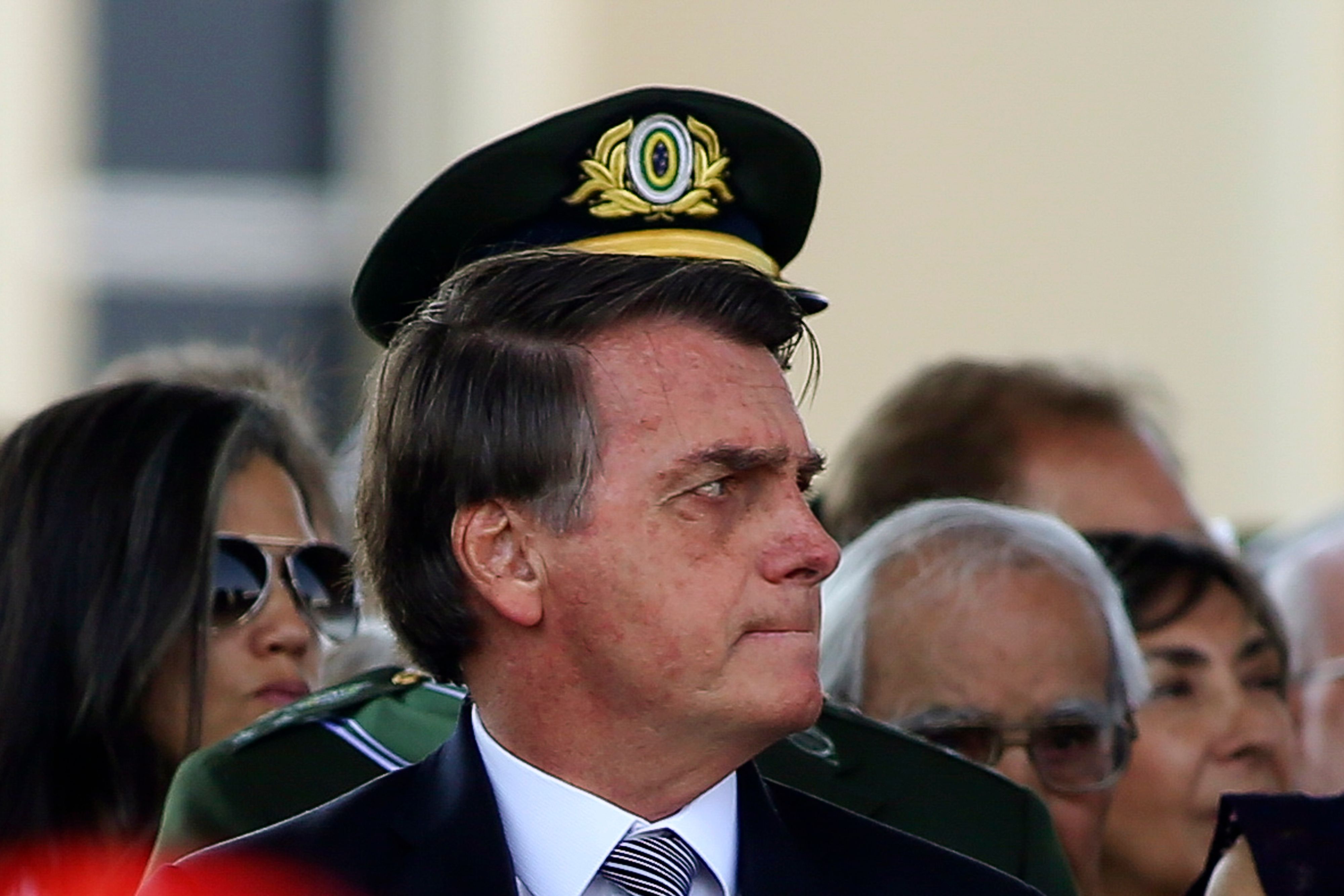 Brazilian President Jair Bolsonaro receives military honors during a military ceremony for Soldier Day at Army Headquarters in Brasilia, Brazil, Friday, August 23, 2019. Brazilian President Jair Bolsonaro says he is inclined to send the army to help fight fires in the Amazon that have scared people around the world. Sergio Lima / AFP.Brazilian President Jair Bolsonaro receives military honors during a ceremony for the Soldier Day at the Brazilian Army Headquarters in Brasilia, Brazil, on August 23, 2019. - Brazilian President Jair Bolsonaro says he is inclined to send the army to help fight fires in the Amazon that have scared people around the world. (Photo by Sergio LIMA / AFP)