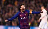 Barcelona's Argentinian forward Lionel Messi celebrates after scoring during the UEFA Champions League quarter-final second leg football match between Barcelona and Manchester United at the Camp Nou stadium in Barcelona on April 16, 2019. (Photo by Josep LAGO / AFP)