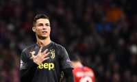 Juventus' Portuguese forward Cristiano Ronaldo gestures during the UEFA Champions League round of 16 first leg football match between Club Atletico de Madrid and Juventus FC at the Wanda Metropolitan stadium in Madrid on February 20, 2019. (Photo by PIERRE-PHILIPPE MARCOU / AFP)