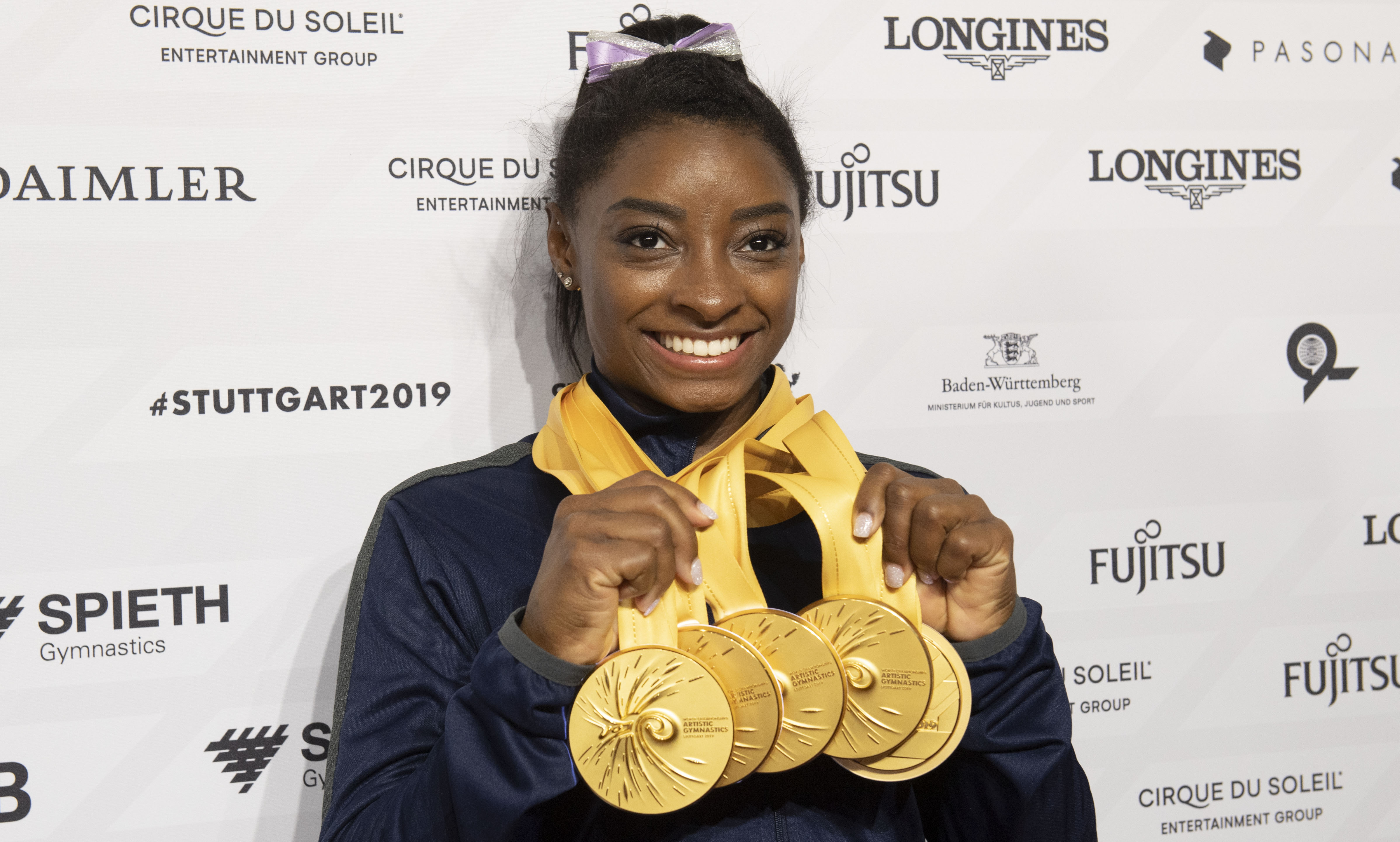 La estadounidense Simone Biles asegura que les puede afectar a todos el cambio de fechas para Tokio. (Foto Prensa Libre: AFP)