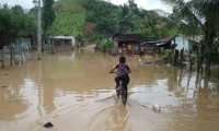 La lluvia de las últimas horas ha causado inundaciones en varias partes del país. (Foto Prensa Libre: Conred)
