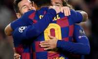 Barcelona's Argentine forward Lionel Messi (L) is congratulated by teammates Barcelona's French forward Antoine Griezmann (R) and Barcelona's Uruguayan forward Luis Suarez (C) after scoring a goal during the UEFA Champions League Group F football match between FC Barcelona and Borussia Dortmund at the Camp Nou stadium in Barcelona, on November 27, 2019. (Photo by Josep LAGO / AFP)