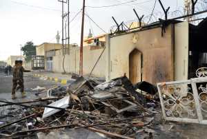 The burnt Iranian consulate is pictured in the southern Iraqi holy city of Najaf on November 28, 2019, two months into the country's most serious social crisis in decades. - At least eight Iraqi protesters were shot dead yesterday in clashes with security forces in the southern city of Nasiriyah, medical and security sources said, as authorities cracked down on anti-government demonstrators after an attack on Iran's consulate in Najaf. Around 50 others more wounded, several in critical condition, when security forces tried to retake two bridges in Nasiriyah that had been blocked by the protesters, the sources said, after reporting an earlier toll of two dead. (Photo by Haidar HAMDANI / AFP)