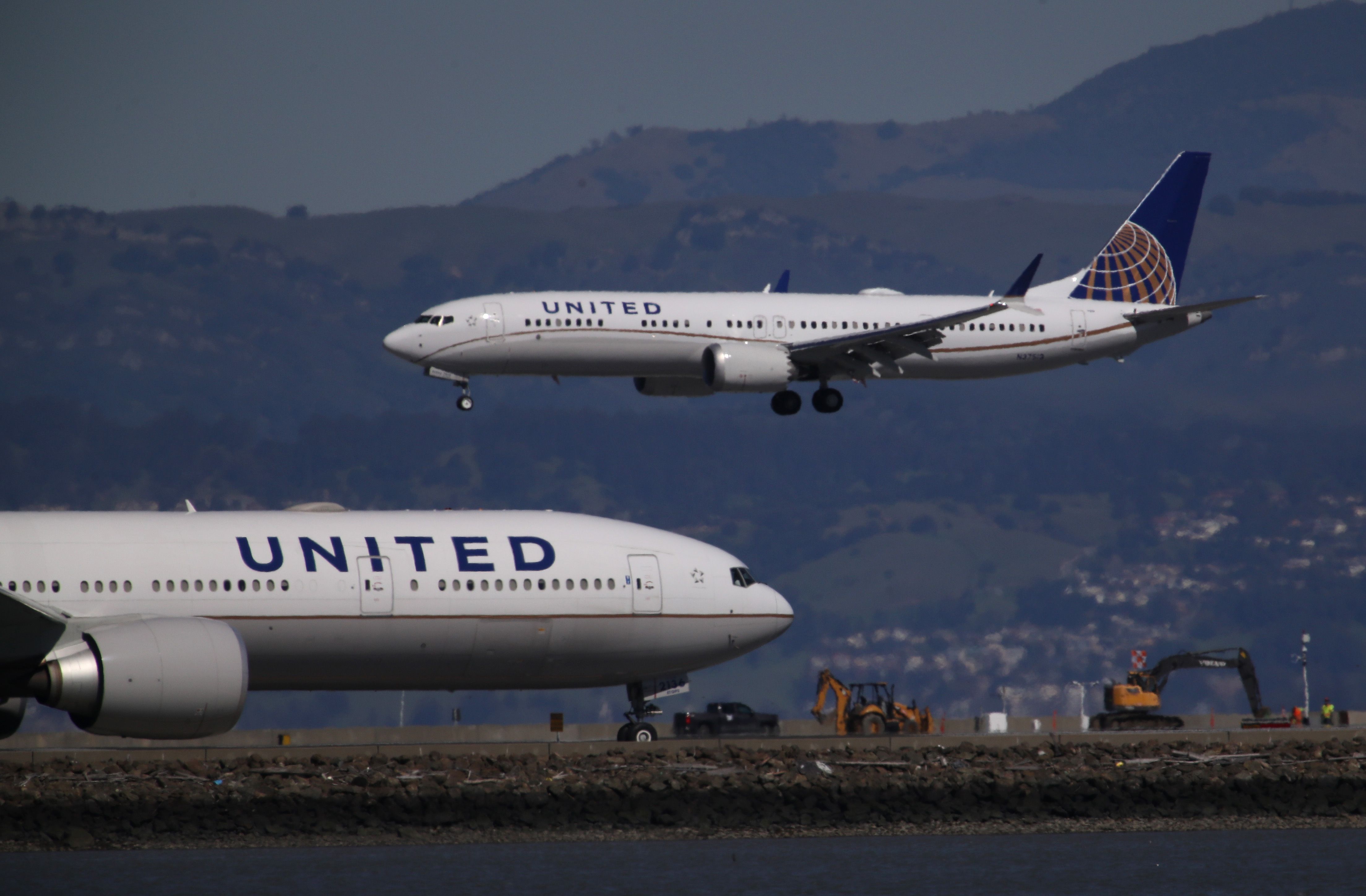 FILES) In this file photo taken on March 13, 2019, a United Airlines Boeing 737 Max 9 aircraft lands at San Francisco International Airport in Burlingame, California. - Boeing said December 16, 2019 it would temporarily suspend production of its globally grounded 737 MAX jets next month as the company struggles to get the beleaguered aircraft back in the air after two crashes.
However the company said it currently has no plans to lay off or furlough workers as a result. (Photo by JUSTIN SULLIVAN / GETTY IMAGES NORTH AMERICA / AFP)