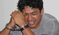Daniel Lorenzo Pascual se ríe al escuchar le sentencia en su contra, en Huehuetenango. (Foto Prensa Libre: Mike Castillo).
