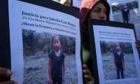 Protesta en Tijuana, México, por la muerte de la niña guatemalteca Jakelin Caal. (Foto Prensa Libre: AFP) 