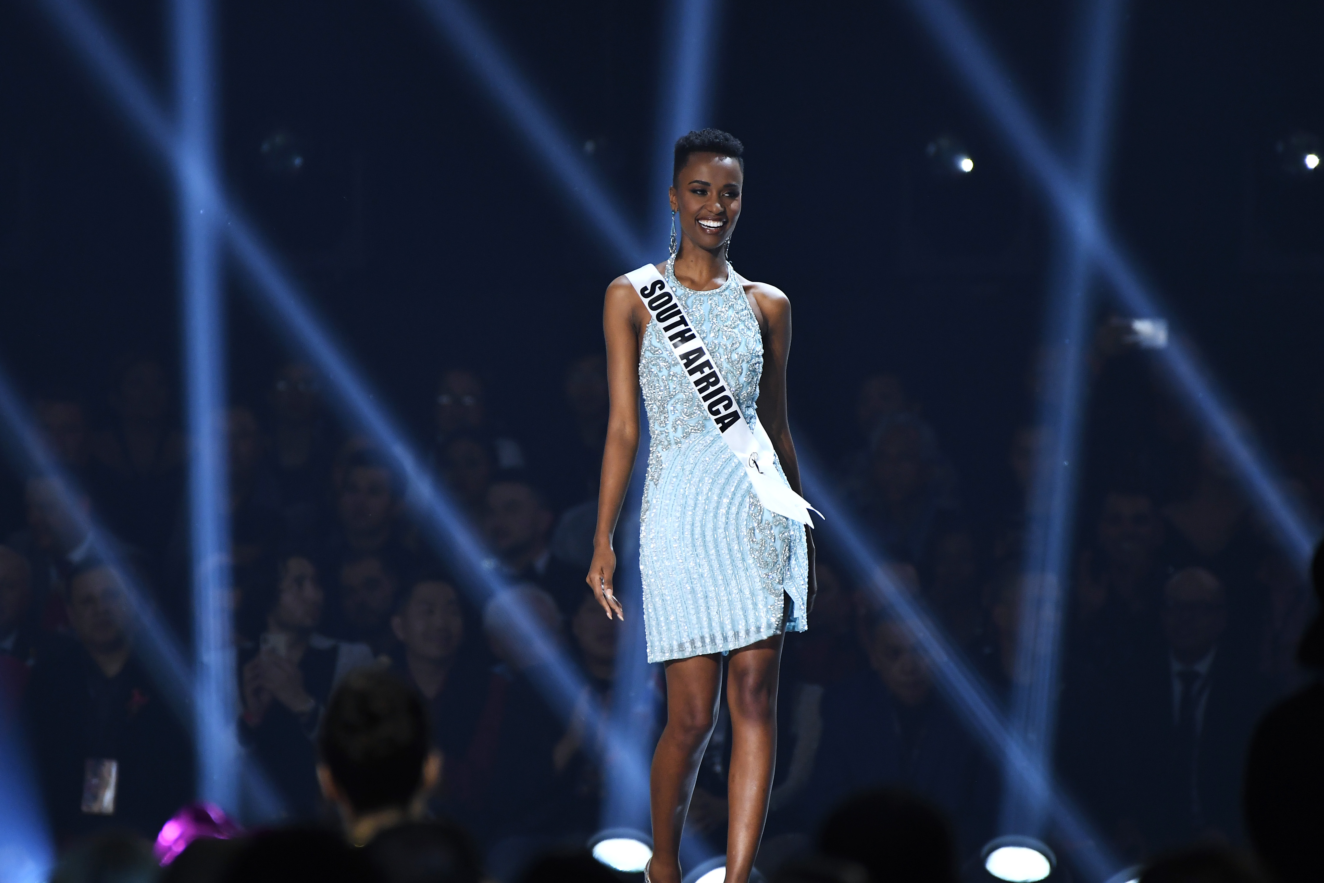ATLANTA, GEORGIA - DECEMBER 08: (EDITORIAL USE ONLY) Miss South Africa Zozibini Tunzi appears onstage at the 2019 Miss Universe Pageant at Tyler Perry Studios on December 08, 2019 in Atlanta, Georgia.   Paras Griffin/Getty Images/AFP
