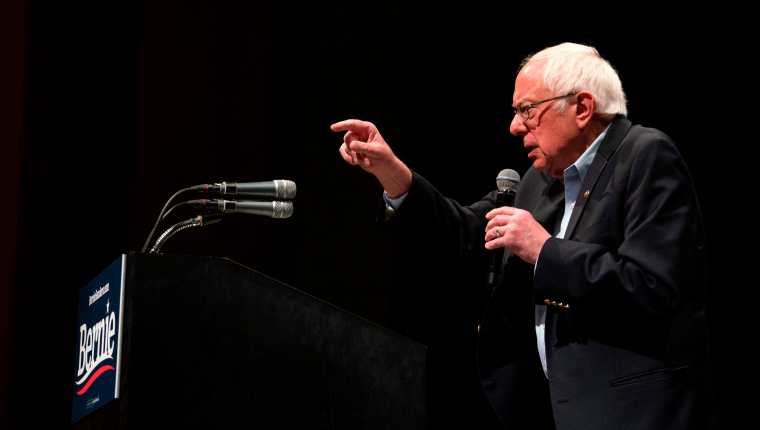 Democratic presidential hopeful Vermont Senator Bernie Sanders gesures as he speaks during a rally at the Abraham Chavez Theater on February 22, 2020 in El Paso, Texas. - Leftist Bernie Sanders took an early lead on February 22 in Nevada's caucuses, the third nominating contest for Democrats in their high-stakes process to see who will challenge Republican Donald Trump in November's presidential election. (Photo by Paul Ratje / AFP)