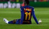 (FILES) In this file photo taken on November 27, 2019 Barcelona's French forward Ousmane Dembele sits on the ground after an injury during the UEFA Champions League Group F football match between FC Barcelona and Borussia Dortmund at the Camp Nou stadium in Barcelona, on November 27, 2019. - French international forward Ousmane Dembele has suffered a badly torn hamstring, his club Barcelona announced on February 4, 2020.
The 22-year-old has struggled with hamstring problems. He had only just returned to training from an injury to the right thigh he suffered in November before suffering a fresh problem in training. (Photo by Josep LAGO / AFP)