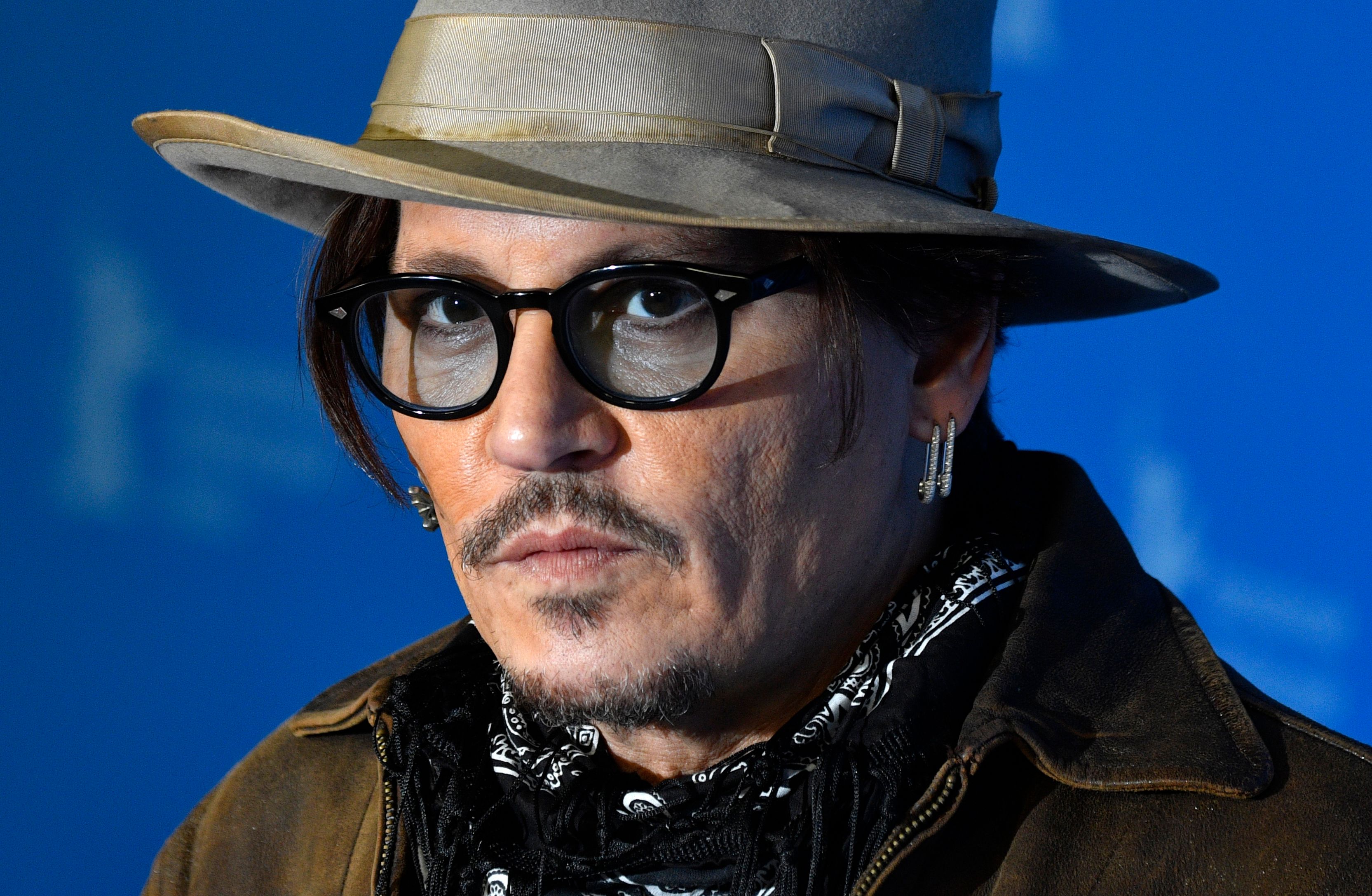 Johnny Depp demanda por difamación a un periódico sensacionalista que lo había presentado como un esposo violento. (Foto Prensa Libre: AFP)