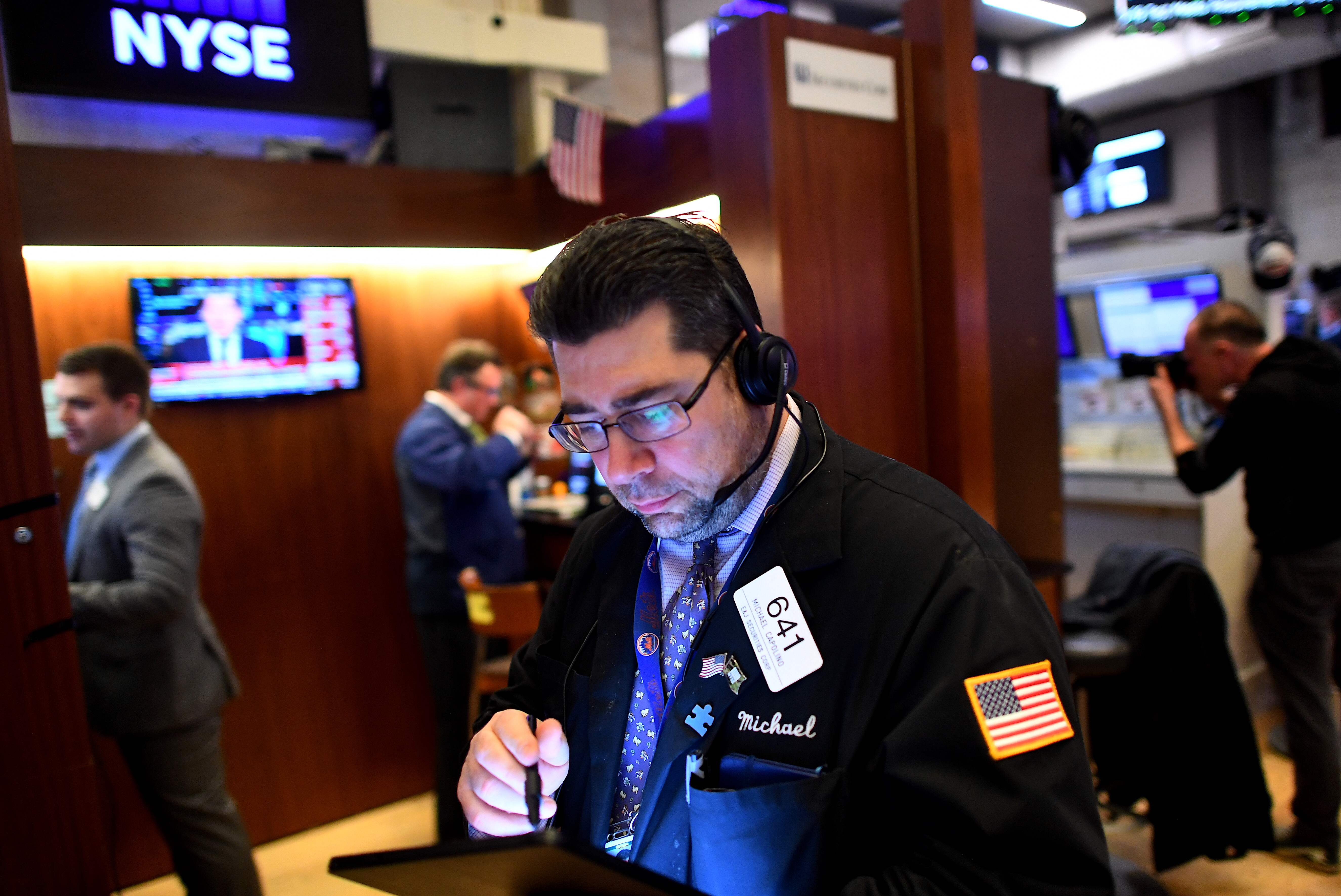 Las bolsas vuelven al rojo por el temor a la extensión del virus en EE. UU. (Foto Prensa Libre: AFP)