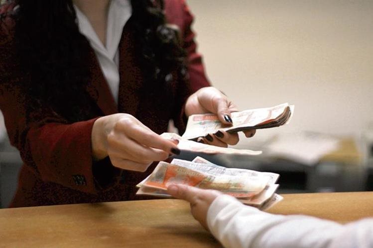 Unos Q40 mil 304.1 millones fue lo que se destinó en ahorro e inversión el año pasado como producto de las remesas familiares en Guatemala, según la estructura de la Encuesta sobre Migración Internacional y Remesas. (Foto Prensa Libre: Hemeroteca PL)