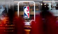 NEW YORK, NY - MARCH 12: An NBA logo is shown at the 5th Avenue NBA store on March 12, 2020 in New York City. The National Basketball Association said they would suspend all games after player Rudy Gobert of the Utah Jazz reportedly tested positive for the Coronavirus (COVID-19).   Jeenah Moon/Getty Images/AFP
== FOR NEWSPAPERS, INTERNET, TELCOS & TELEVISION USE ONLY ==
