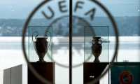 Nyon (Switzerland), 18/09/2014.- (FILE) - The UEFA Champions League trophy (L) and the Henri Delaunay trophy (R) of the UEFA EURO soccer championship on display at the UEFA headquarters in Nyon, Switzerland, 18 September 2014 (re-issued on 17 March 2020). The UEFA EURO 2020 has been postponed to 2021 amid the coronavirus COVID-19 pandemic, the Norwegian Football Association (NFF) announced on 17 March 2020. (Liga de Campeones, Suiza) EFE/EPA/JEAN-CHRISTOPHE BOTT