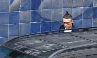 (FILES) In this file photo taken on March 03, 2020 Juventus' Portuguese forward Cristiano Ronaldo gets into a car upon his arrival at Madeira airport in Funchal on March 3, 2020. - Portuguese football star Cristiano Ronaldo remains confined to his home in Madeira after Juventus teammate Daniele Rugani tested positive for the new coronavirus, but has no symptoms, regional authorities in Madeira said on March 22, 2020. (Photo by RUI SILVA / AFP)