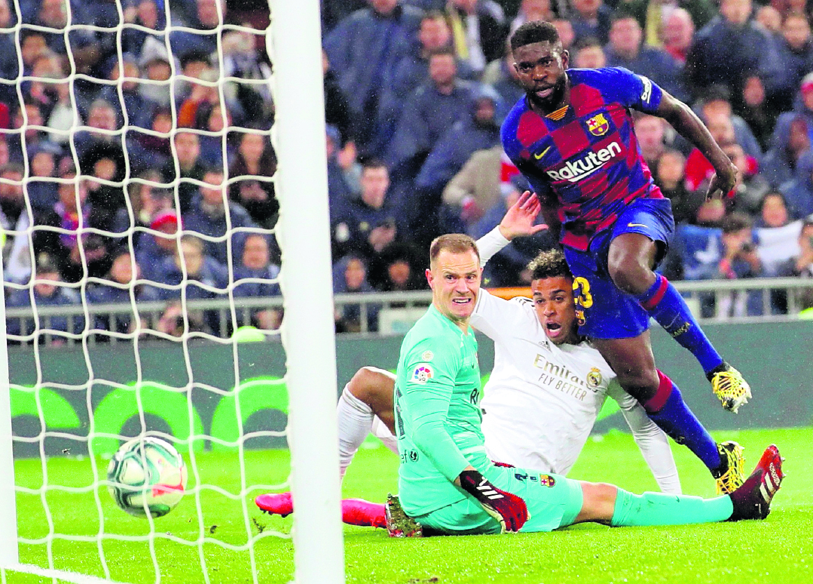 El Barcelona y el Real Madrid estarían clasificados a la Champions League. (Foto Prensa Libre: EFE)