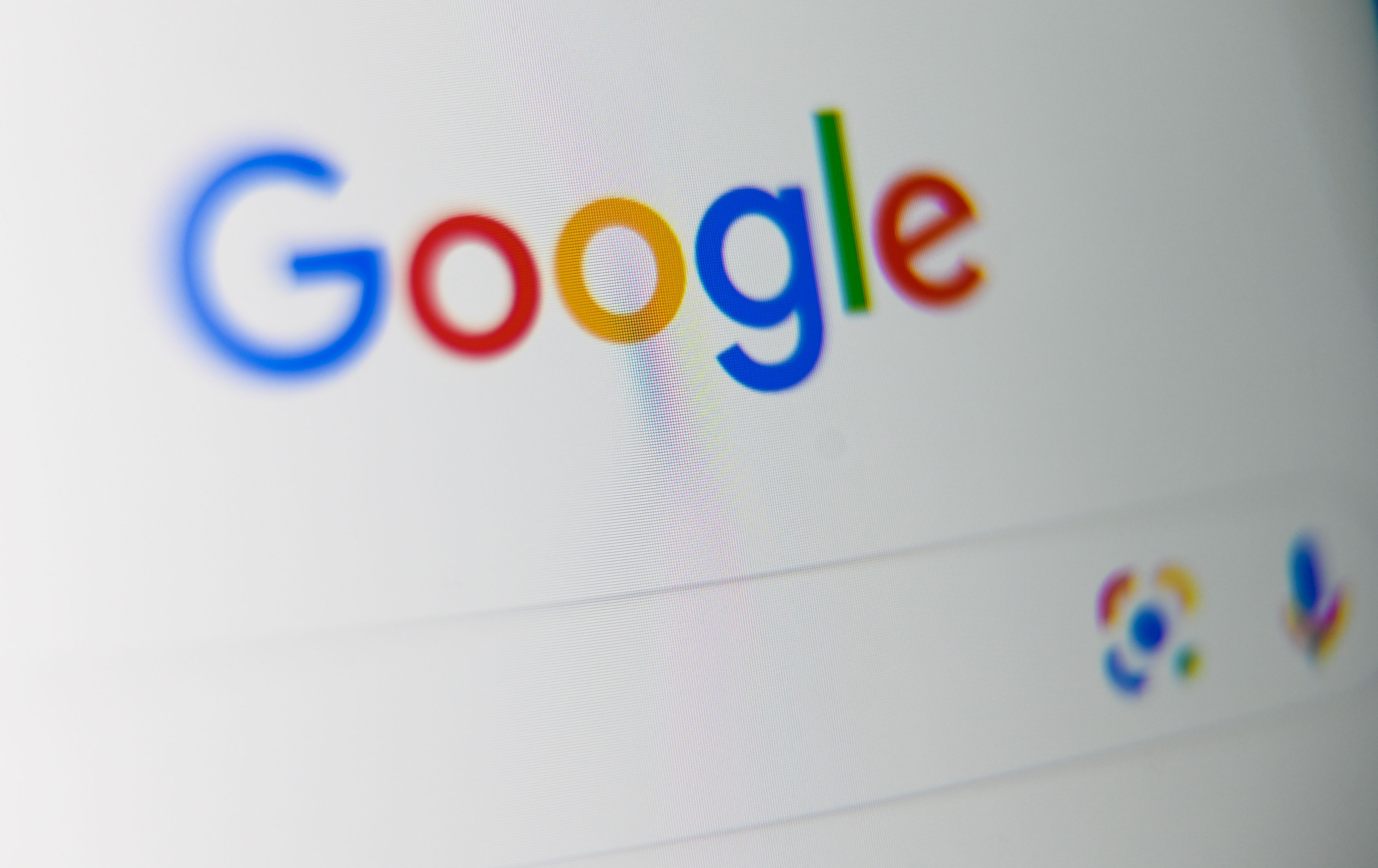 (FILES) This file photo taken on September 03, 2019 shows the US multinational technology and Internet-related services company Google logo, displayed on a tablet screen, in Lille, northern France. - France's highest administrative authority on June 19. 2020, dismissed a challenge by Google against a fine of 50 million euros ($56 million) for failing to provide adequate information on its data consent policies. The fine was imposed in 2019 by France's data watchdog, the CNIL. (Photo by DENIS CHARLET / AFP)