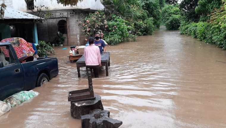 Inundaciones en San José la Máquina, Suchitepéquez. (Foto Prensa Libre: Conred). 