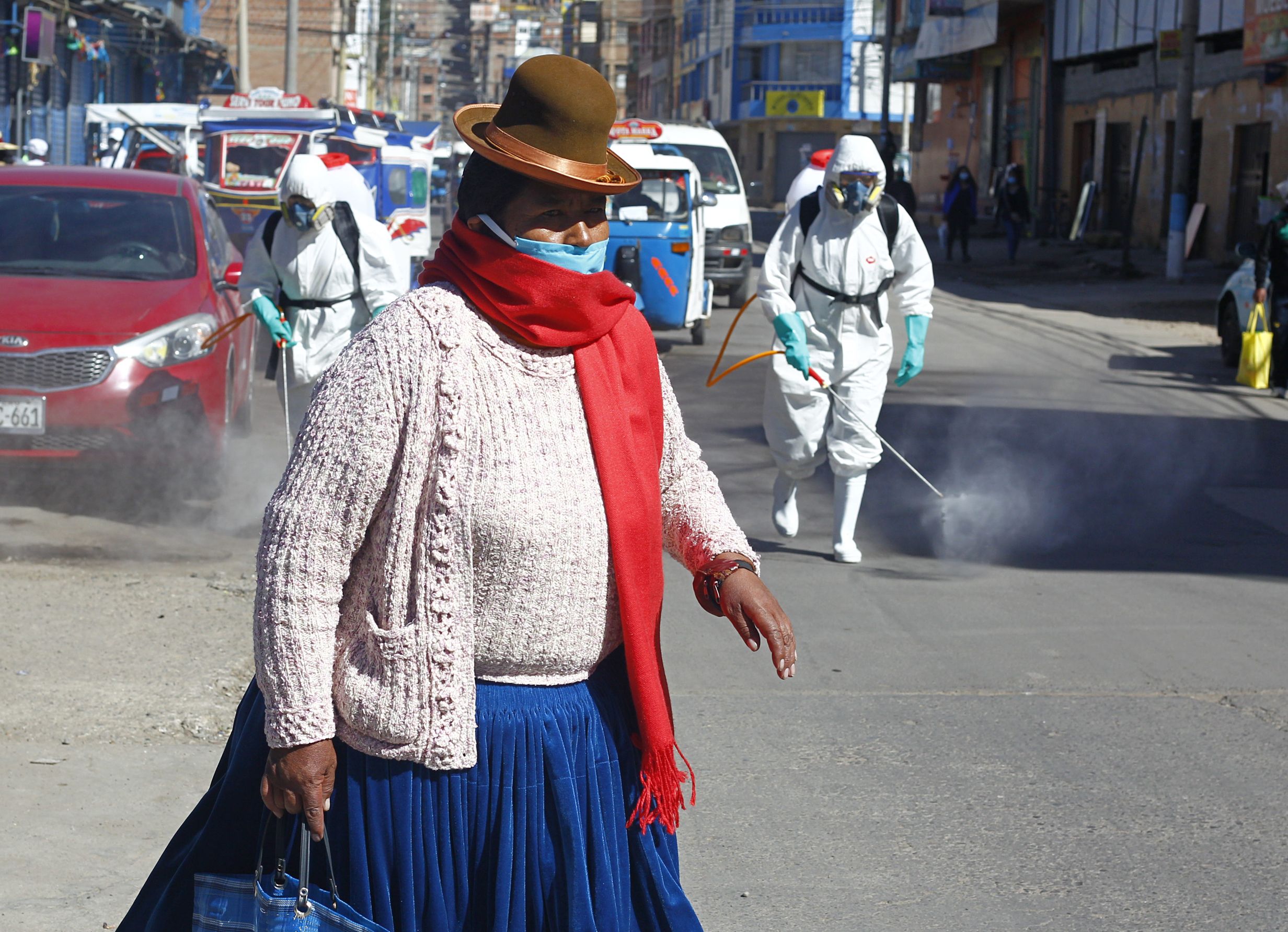 Los habitantes de las alturas andinas de Bolivia y Perú han resistido mejor el nuevo coronavirus. que sus compatriotas de las tierras bajas, lo que ha llamado la atención de los expertos. (Foto Prensa Libre: AFP)
