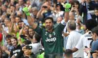 (FILES) In this file photo taken on May 19, 2018 Juventus' goalkeeper from Italy Gianluigi Buffon reacts as he leaves the pitch for his last game with Juventus team during the Italian Serie A football match Juventus versus Verona, at the Allianz Stadium in Turin. - The legendary Italian goalkeeper Gianluigi Buffon should become on July 4, 2020 the sole holder of the record for the number of games played in Serie A with 648 appointment with Italian football team Juventus. (Photo by MARCO BERTORELLO / AFP)