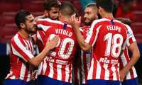 Atletico Madrid's Spanish forward Diego Costa (2L) celebrates his goal with teamates during the Spanish league football match between Club Atletico de Madrid and Real Betis at the Wanda Metropolitano stadium in Madrid on July 11, 2020. (Photo by GABRIEL BOUYS / AFP)