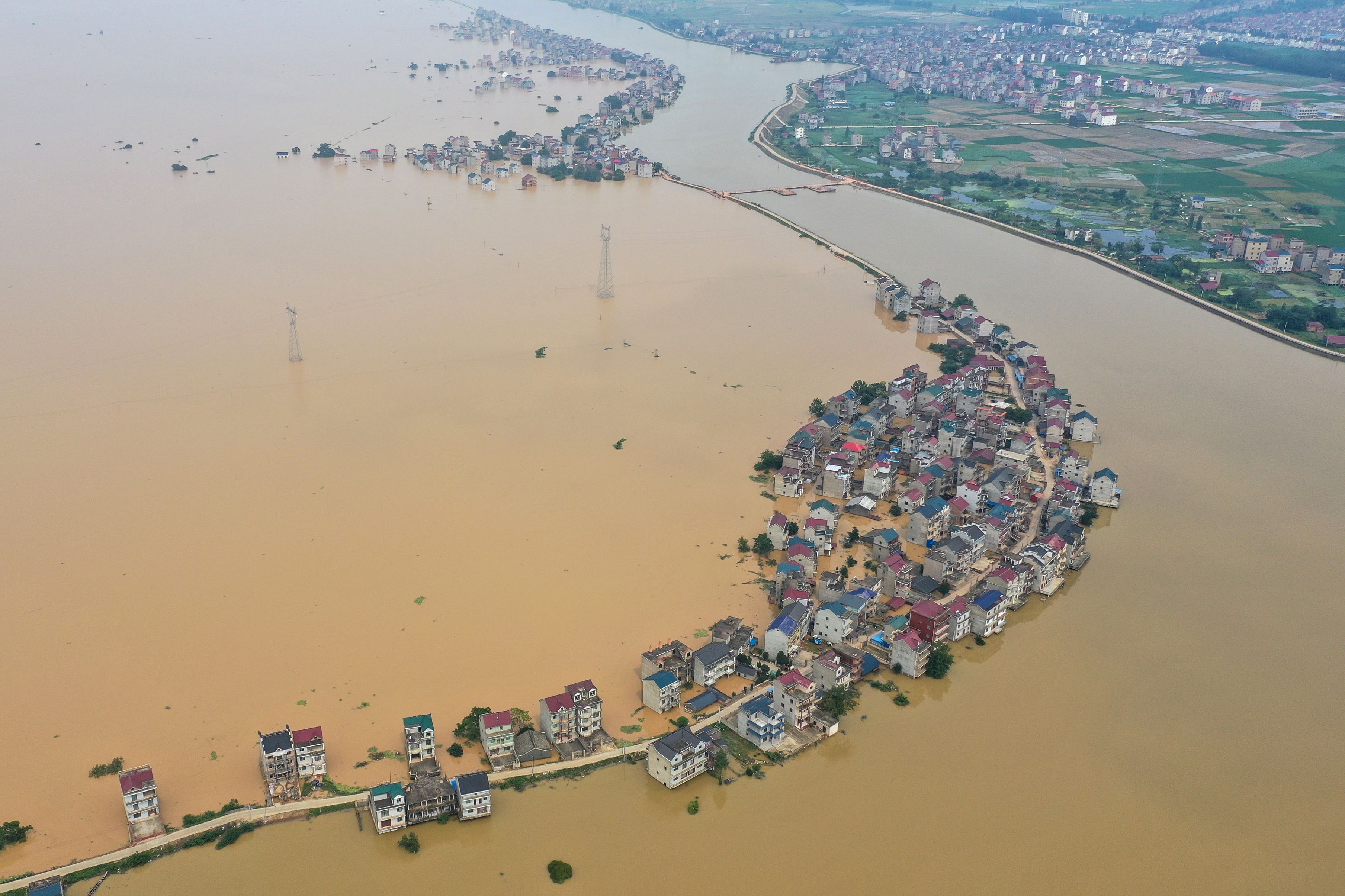 Vista aérea de las inundaciones en Jiujiang en la provincia central de Jiangxi de China. (Foto Prensa Libre: AFP)