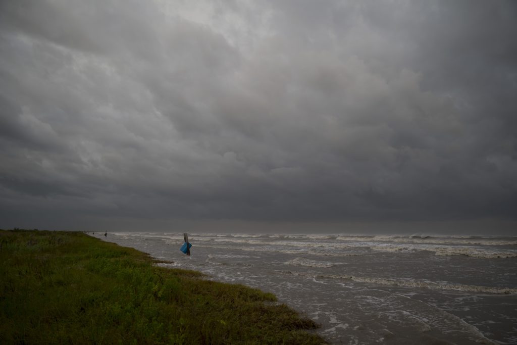 SABINE PASS, TX - AUGUST 26: Waves from the storm surge from Hurricane Laura began to come ashore at Sea Rim State Park on August 26, 2020 in Sabine Pass, Texas. Laura rapidly strengthened to a Category 4 hurricane during the day, prompting the National Hurricane Center to describe the accompanying storm surge as "unsurvivable" and noted that it could penetrate up to 30 miles inland from the immediate coastline.   Eric Thayer/Getty Images/AFP
== FOR NEWSPAPERS, INTERNET, TELCOS & TELEVISION USE ONLY ==