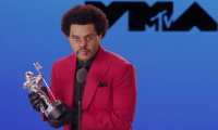 This handout image released courtesy of MTV shows Canadian singer-songwriter The Weeknd accepting the award for Video of the Year for "Blinding Lights" during the 2020 MTV Video Music Awards, being held virtually amid the coronavirus pandemic, broadcast on August 30, 2020 in New York. (Photo by - / MTV / AFP) / RESTRICTED TO EDITORIAL USE - MANDATORY CREDIT "AFP PHOTO / MTV " - NO MARKETING - NO ADVERTISING CAMPAIGNS - DISTRIBUTED AS A SERVICE TO CLIENTS