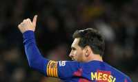(FILES) In this file photo taken on March 07, 2020, Barcelona's Argentine forward Lionel Messi celebrates after scoring a goal during the Spanish league football match between FC Barcelona and Real Sociedad at the Camp Nou stadium in Barcelona, Spain. - Lionel Messi said on September 4, 2020 that he will stay at Barcelona, insisting he could never go to court against "the club of his life". (Photo by LLUIS GENE / AFP)