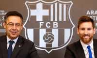 (FILES) This handout photo taken on November 25, 2017 in Barcelona and released by the Barcelona FC press office, shows Barcelona FC President Josep Maria Bartomeu (L) and Barcelona's Argentinian forward Lionel Messi signing a contract extension keeping Messi at Barcelona until 2021. - Six-time Ballon d'Or winner Lionel Messi told Barcelona he wants to leave -- on a free transfer -- in a "bombshell" fax yesterday that is expected to spark a legal battle over a buy-out clause worth hundreds of millions of dollars. (Photo by Handout / FC BARCELONA / AFP) / RESTRICTED TO EDITORIAL USE - MANDATORY CREDIT "AFP PHOTO / FC BARCELONA" - NO MARKETING - NO ADVERTISING CAMPAIGNS - DISTRIBUTED AS A SERVICE TO CLIENTS