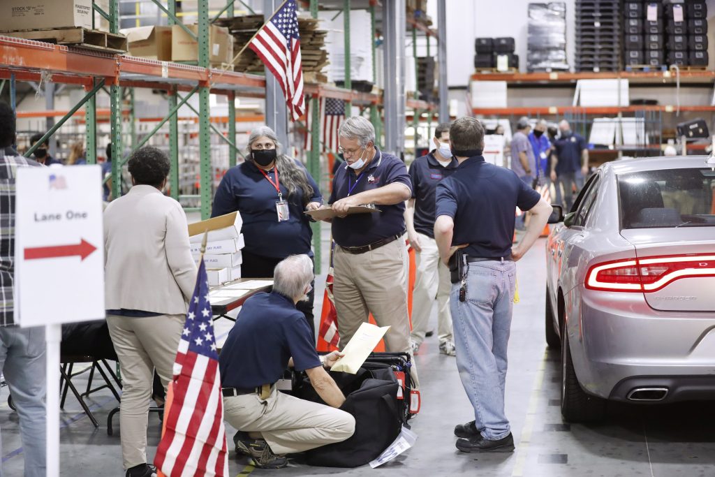 LARGO, FL - NOVEMBER 03: Workers at the Pinellas County Supervisor of Elections Office process voters' ballots inside of the Elections Service Center Operations Department on November 3, 2020 in Largo, Florida. After a record-breaking early voting turnout, Americans head to the polls on the last day to cast their vote for incumbent U.S. President Donald Trump or Democratic nominee Joe Biden in the 2020 presidential election.   Octavio Jones/Getty Images/AFP
== FOR NEWSPAPERS, INTERNET, TELCOS & TELEVISION USE ONLY ==
