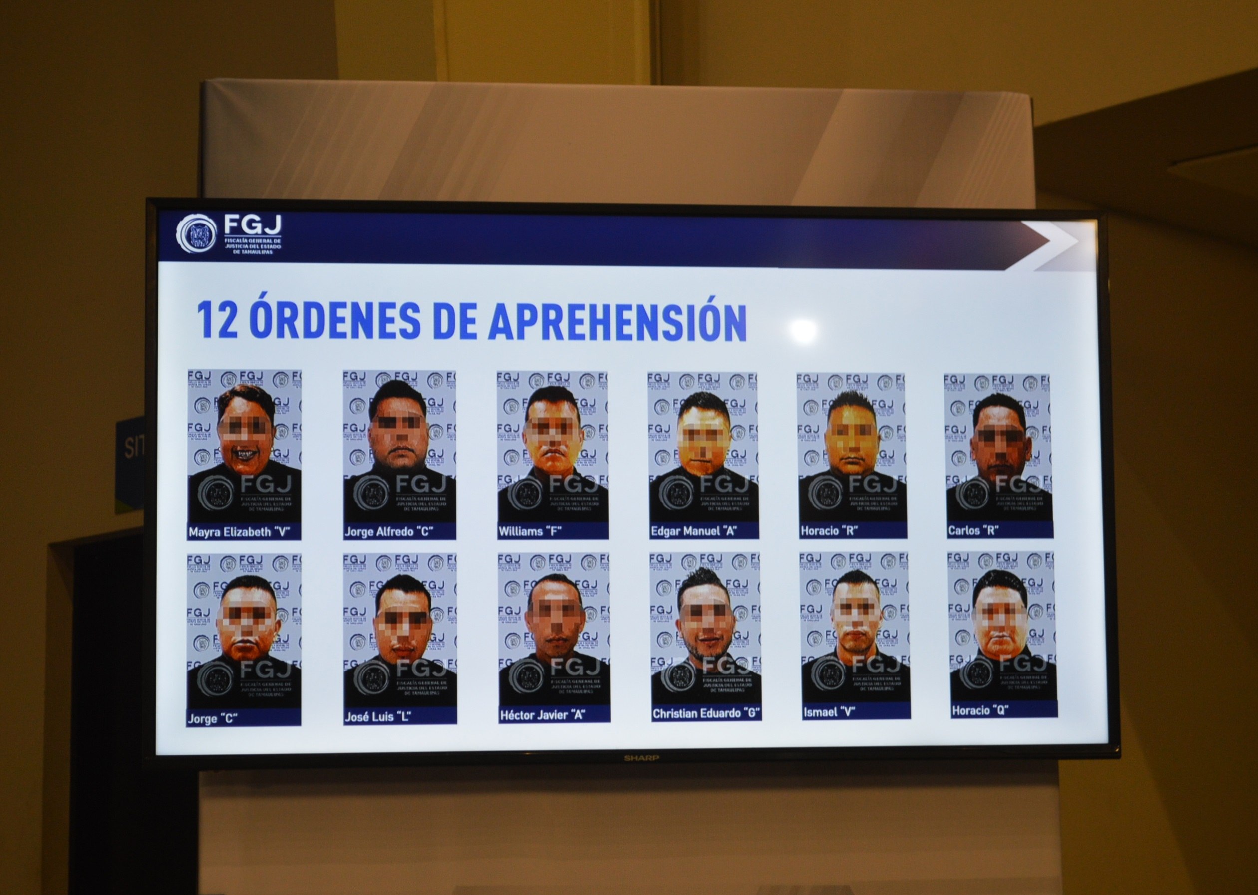 Fotografía mostrada por la Fiscalía del Estado de Tamaulipas de 12 presuntos implicados en el homicidio de 19 migrantes. (Foto: Hemeroteca PL)