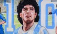 Naples (Italy), 27/02/2021.- A general view of a giant mural dedicated to late soccer legend Diego Armando Maradona, depitcing special moments that have marked his career, realized by street artist Dario Santucci on the locker room wall of what once was the soccer pitch 'Maremorto' in Bacoli, near Naples, Italy, 27 February 2021. (Italia, Nápoles) EFE/EPA/CIRO FUSCO