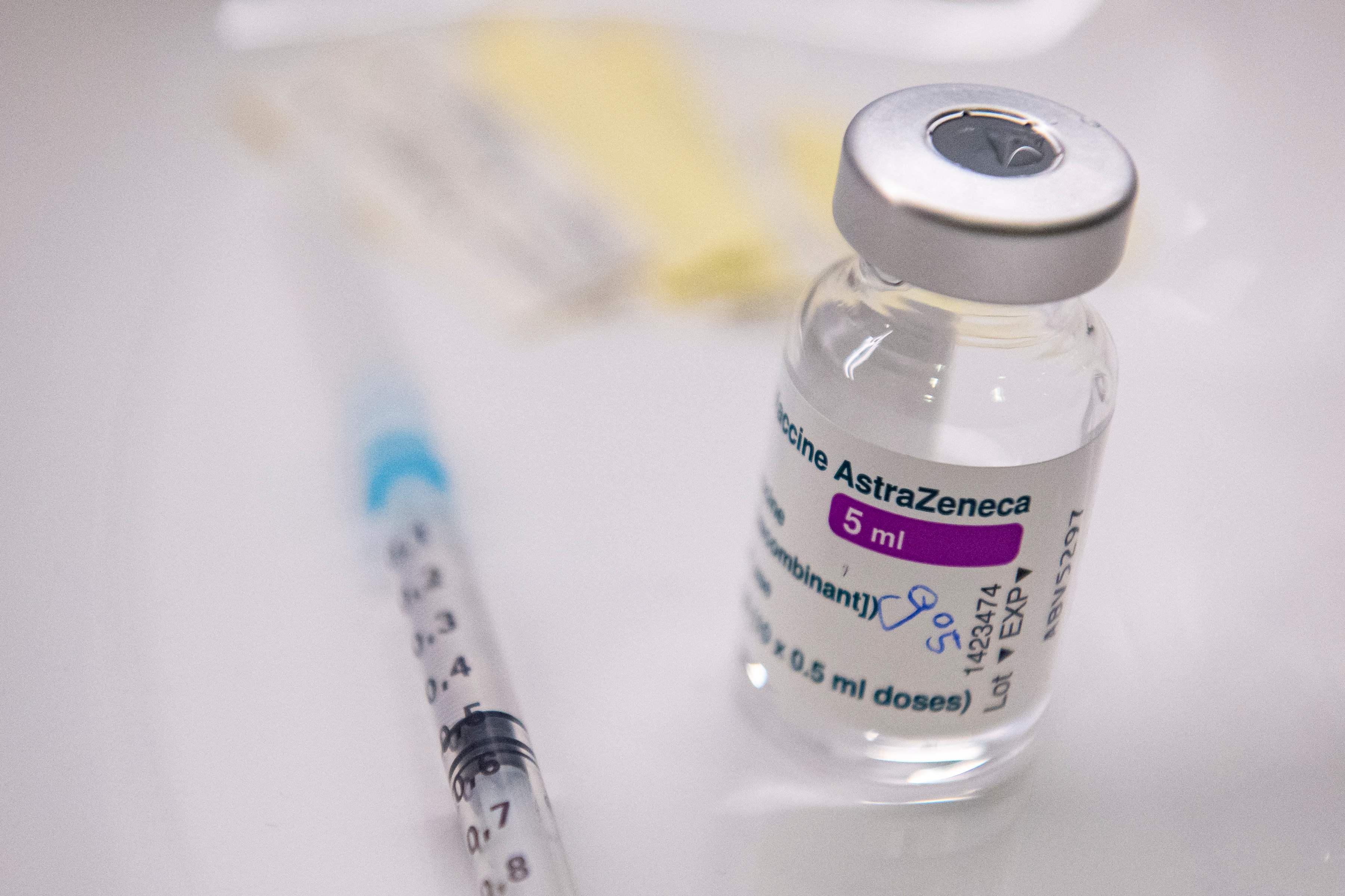 (FILES) In this file photo taken on March 31, 2021 prepared doses of AstraZeneca's vaccine against the coronavirus (Covid-19) are pictured at a doctor's office in Deisenhofen, southern Germany, amid the ongoing pandemic. - Denmark on April 14, 2021 announced it would stop using the AstraZeneca Covid-19 vaccine altogether, becoming the first country to do so over suspected side effects, authorities said. (Photo by LENNART PREISS / AFP)